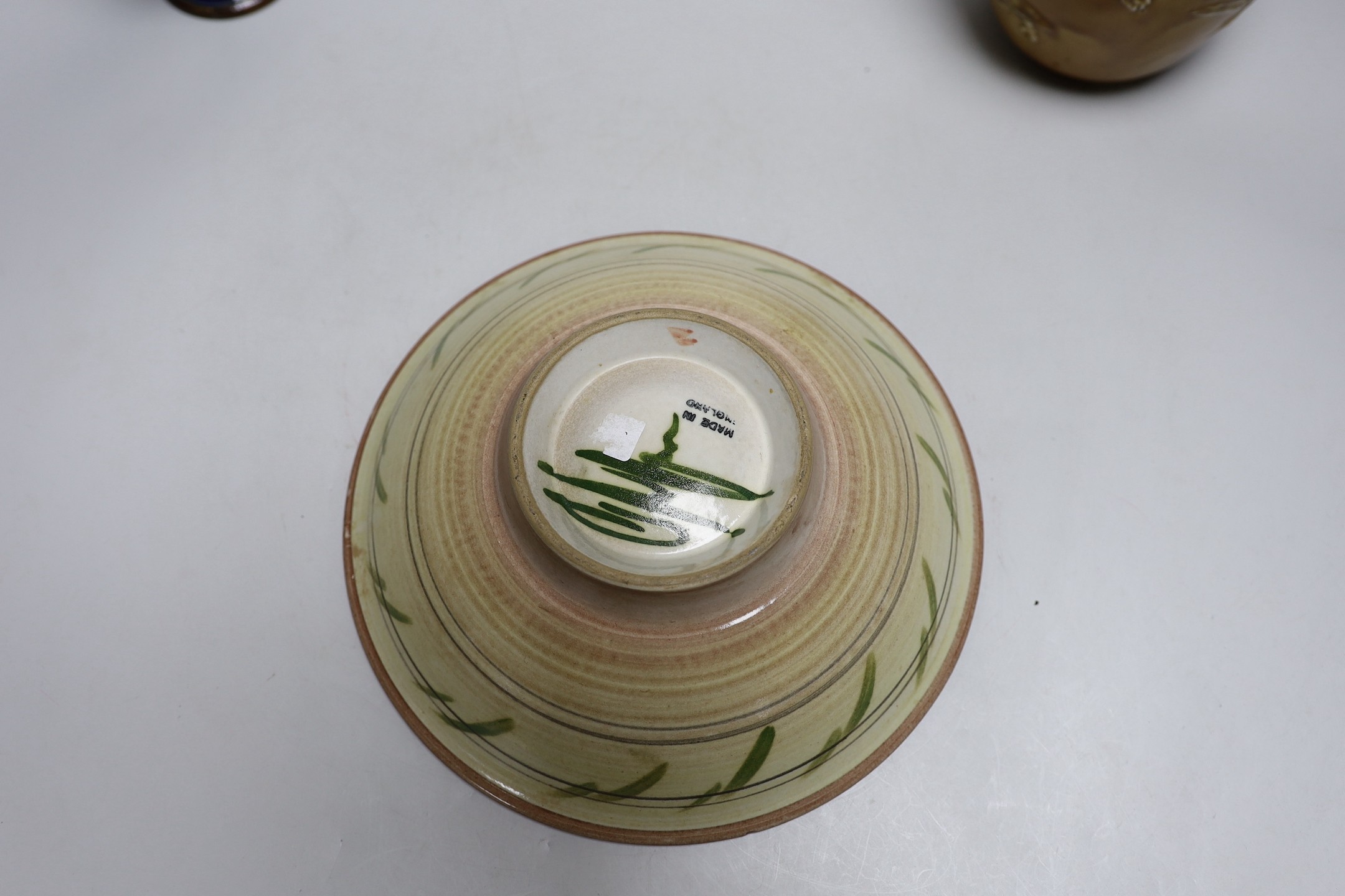 A Doulton stoneware vase and jug, tallest 28cm, together with three art ceramic bowls